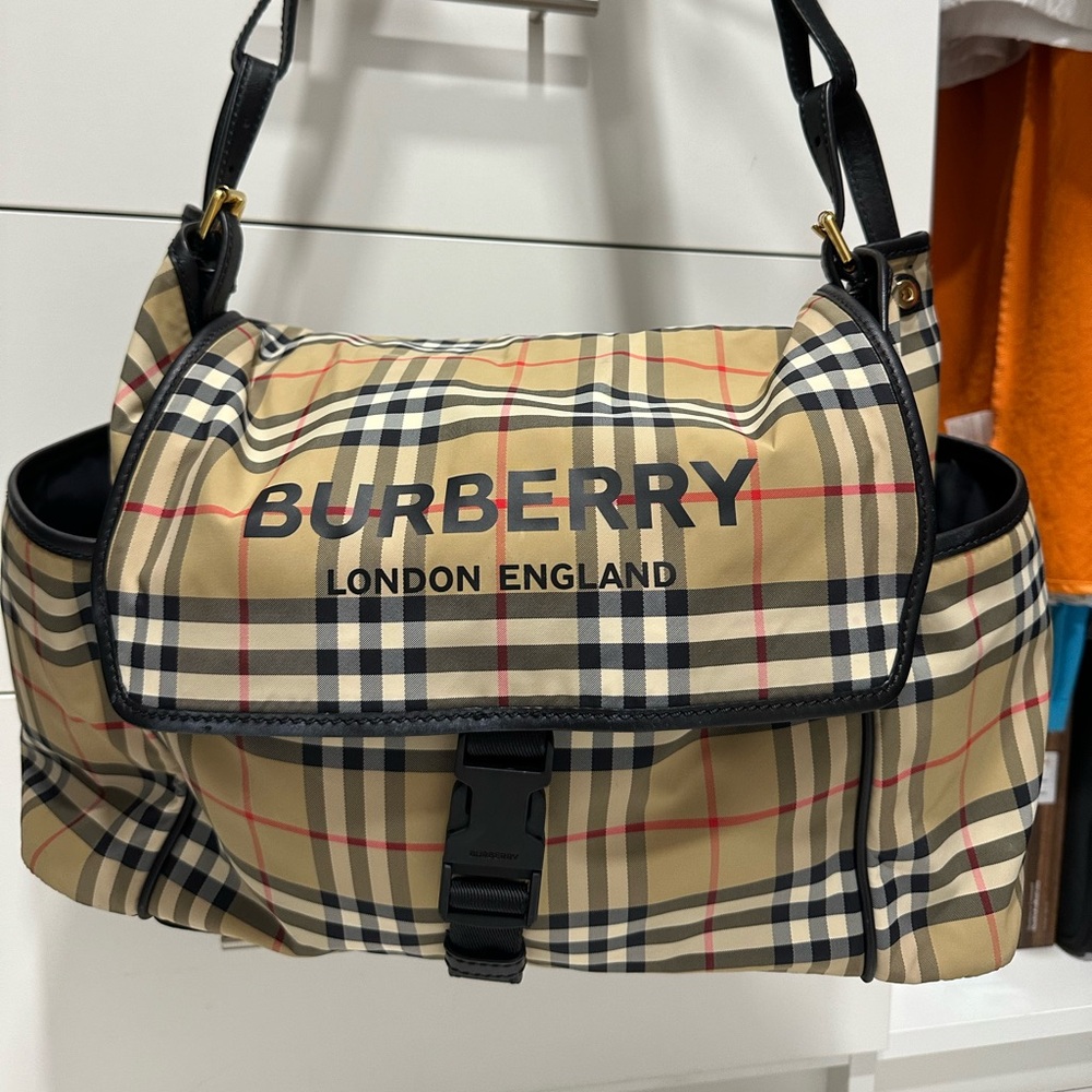 It is a Burberry diaper bag in excellent condition, like new.